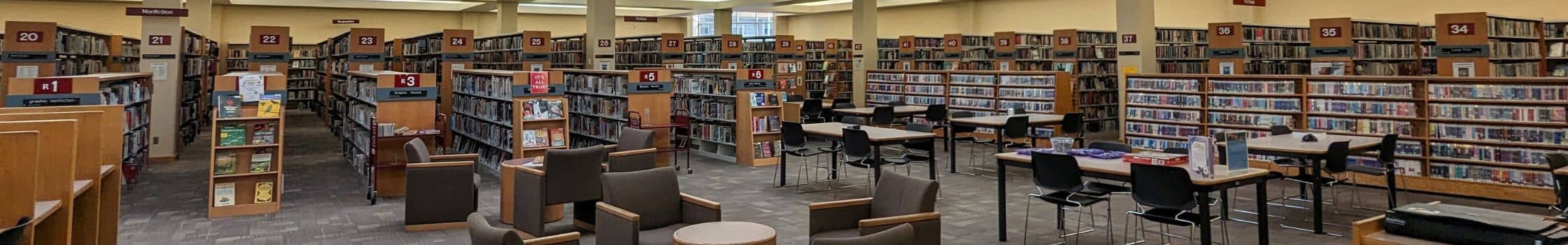 adult services department with books, and seating area